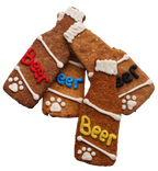 Dog treats shaped like a cross with 'Beer' written on them, on a white background.