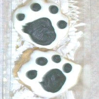 Dog Treats with paw prints on a white background